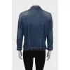 Denim jacket with fringes