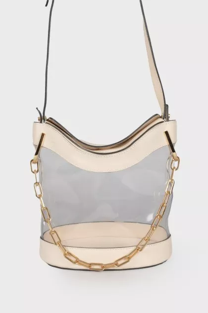Transparent bag with golden hardware