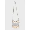 Transparent bag with golden hardware