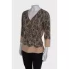 Beige pullover in lace print