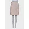 Pleated beige skirt with tag