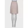 Pleated beige skirt with tag