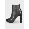 Perforated leather ankle boots