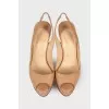 Open heel patent leather shoes
