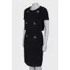 Black dress with gold hardware