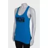 Blue T-shirt with sequins, with a tag