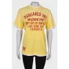 Yellow t-shirt with slogan