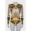 Printed bodysuit with shoulder pads