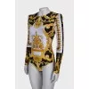 Printed bodysuit with shoulder pads