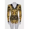Printed bodysuit with shoulder pads