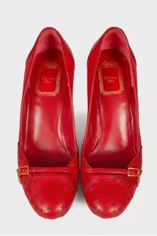 Red perforated shoes