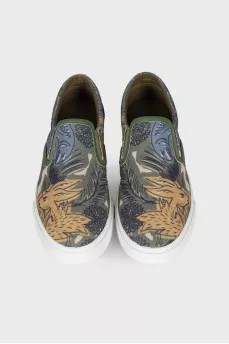 Children's slip-ons, with a tag