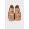 Beige perforated sneakers