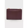 Leather mini bag with gold tone hardware