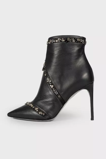 Leather ankle boots decorated with rhinestones