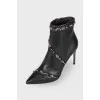 Leather ankle boots decorated with rhinestones