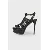 Black woven sandals