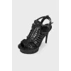 Black woven sandals