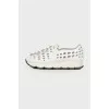 Leather sneakers with perforations and rhinestones
