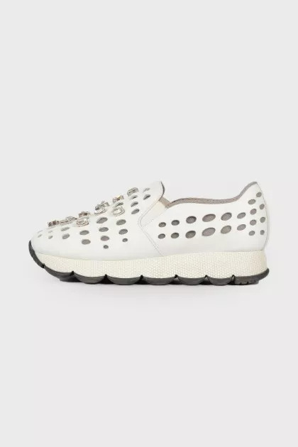 Leather sneakers with perforations and rhinestones