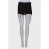 Black ripped effect shorts