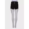 Black ripped effect shorts
