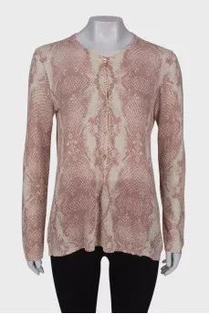 White jumper in pink and gray print
