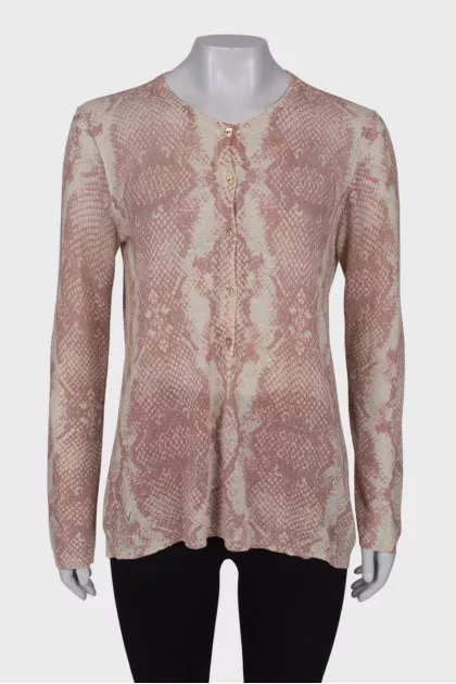White jumper in pink and gray print