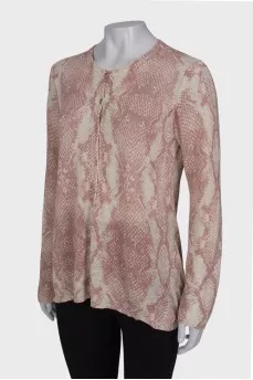 White jumper in pink and gray print