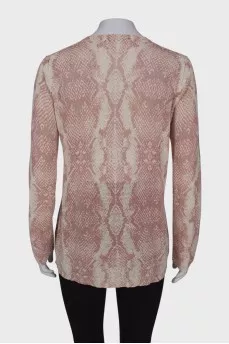 White jumper in pink and gray print