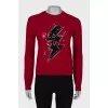 Red sweater with print