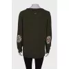 Dark green sweater