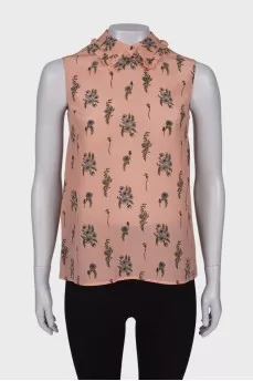 Pink sleeveless blouse