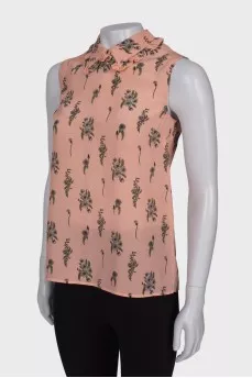 Pink sleeveless blouse