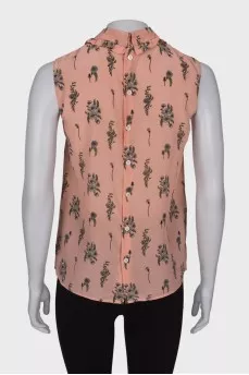 Pink sleeveless blouse