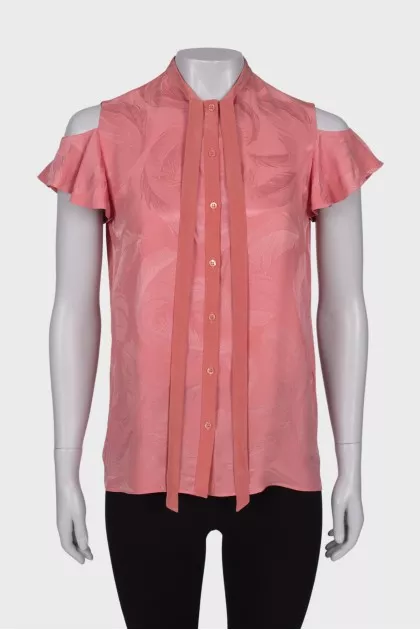 Pink sleeveless blouse