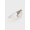 White leather slip-ons