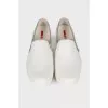 White leather slip-ons