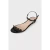 Lacquered sandals with decor