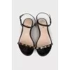 Lacquered sandals with decor