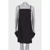 Black dress with asymmetric seam