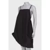 Black dress with asymmetric seam
