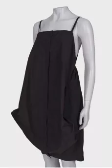 Black dress with asymmetric seam