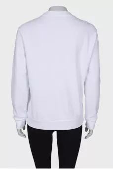 Sweatshirt decorated with beads