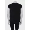 Black T-shirt with gold trim