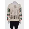 Knitted sweater with tag