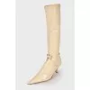 Combined pointed toe boots