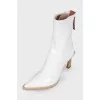White pointed toe ankle boots