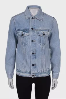 Blue denim jacket with tag