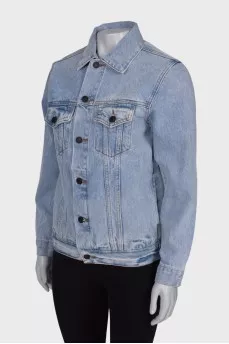 Blue denim jacket with tag